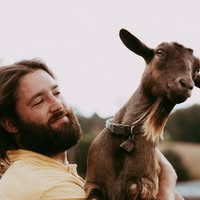 Rob Blackwell holding one of the farm's goats
